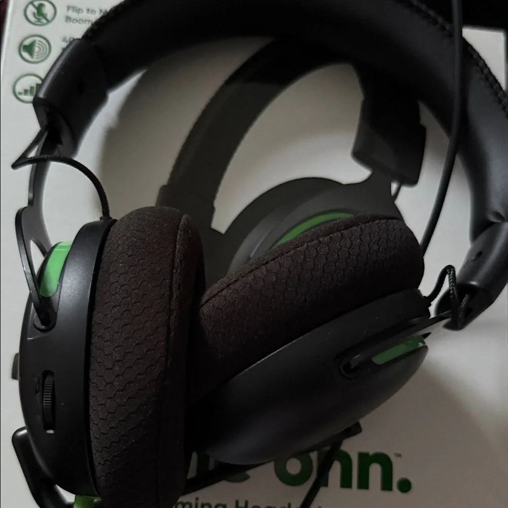On Running Black and Green Gaming Headset